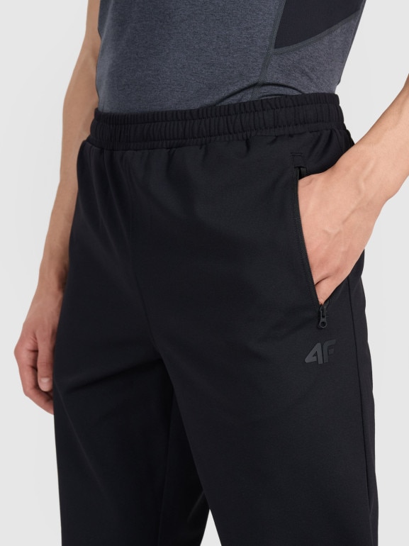 Męskie spodnie treningowe 4F 4FWMM00TFTRM1067 - czarne