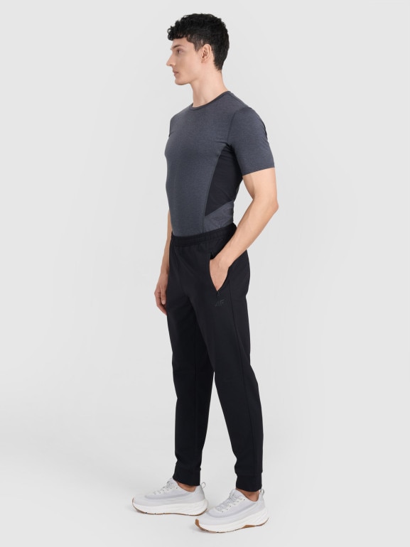 Męskie spodnie treningowe 4F 4FWMM00TFTRM1067 - czarne