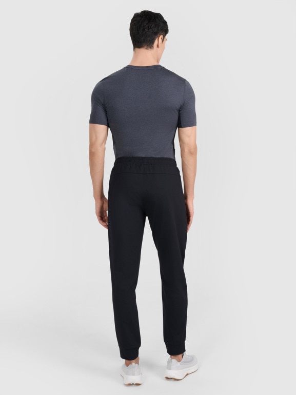 Męskie spodnie treningowe 4F 4FWMM00TFTRM1067 - czarne