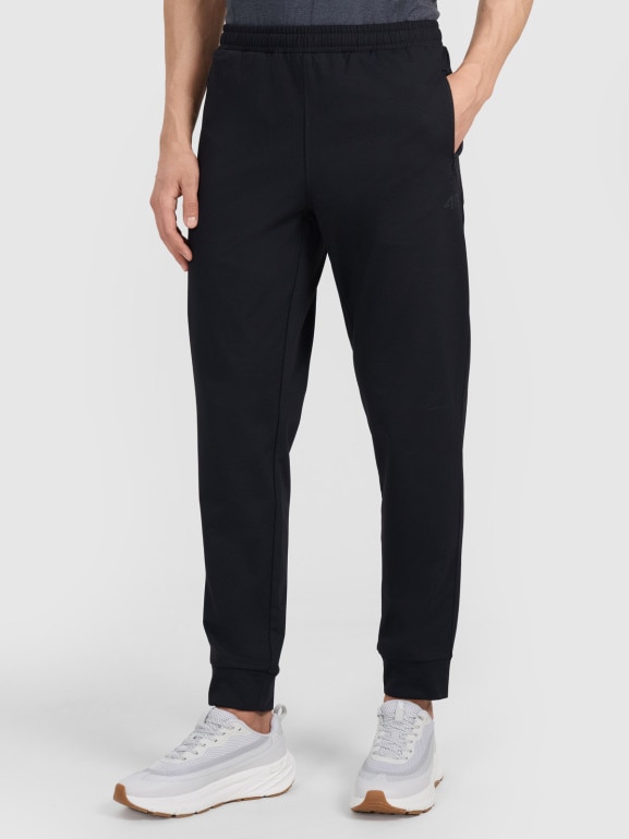 Męskie spodnie treningowe 4F 4FWMM00TFTRM1067 - czarne