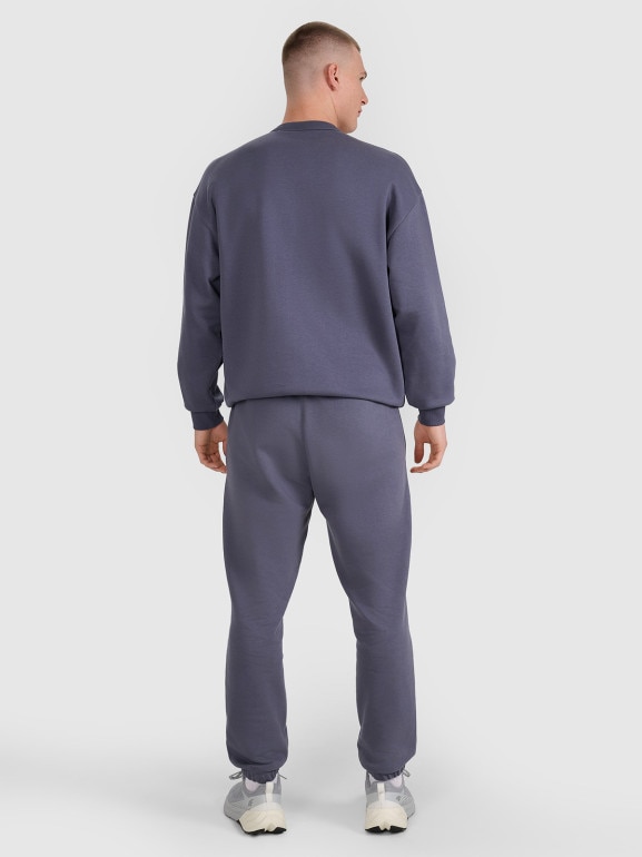 Spodnie dresowe joggery uniseks 4F 4FWSS25TTROU0997 - granatowe