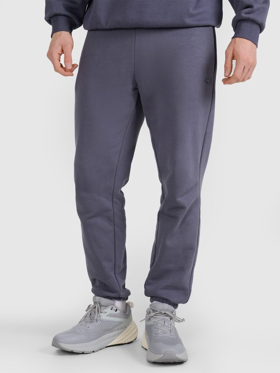 Spodnie dresowe joggery uniseks 4F 4FWSS25TTROU0997 - granatowe
