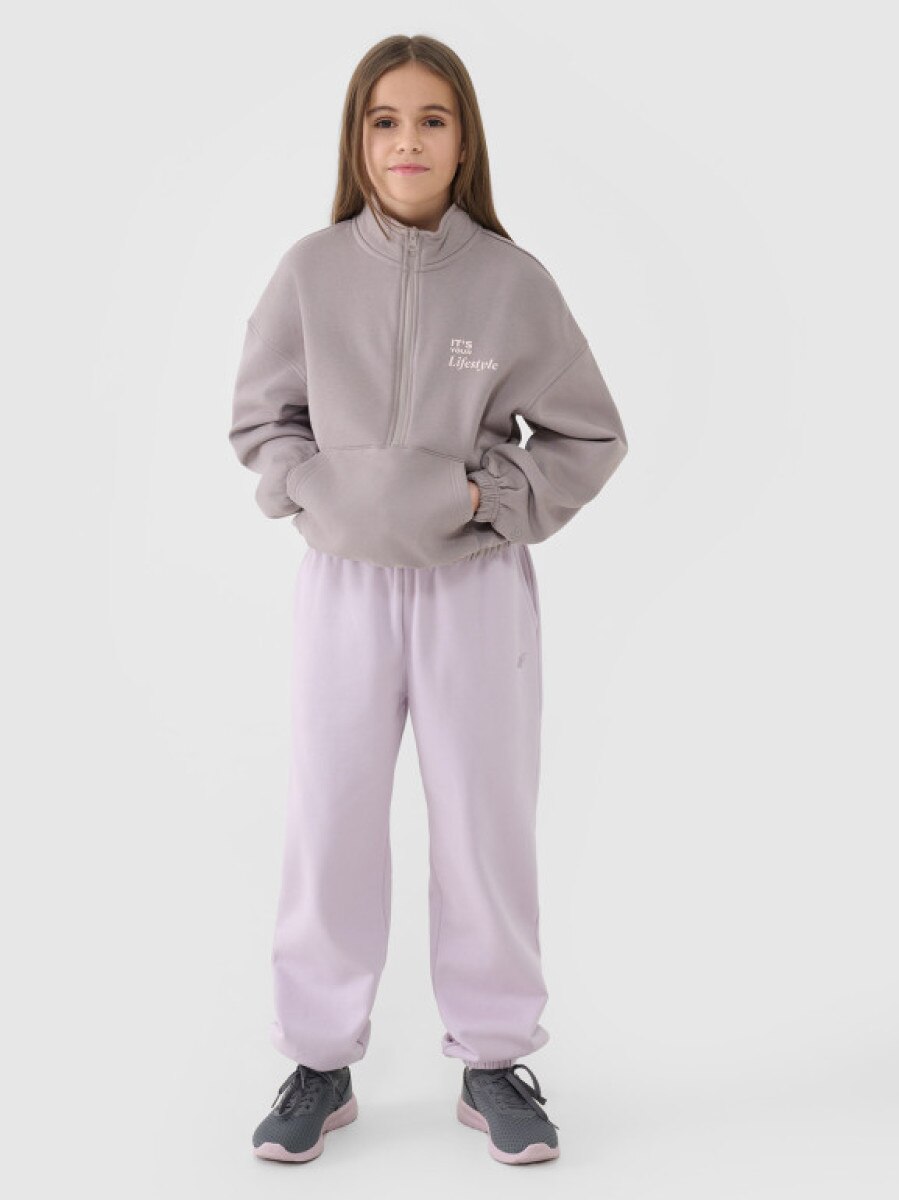 Dziewczęce spodnie dresowe joggery 4F 4FJASAW24TTROF1403 - fioletowe