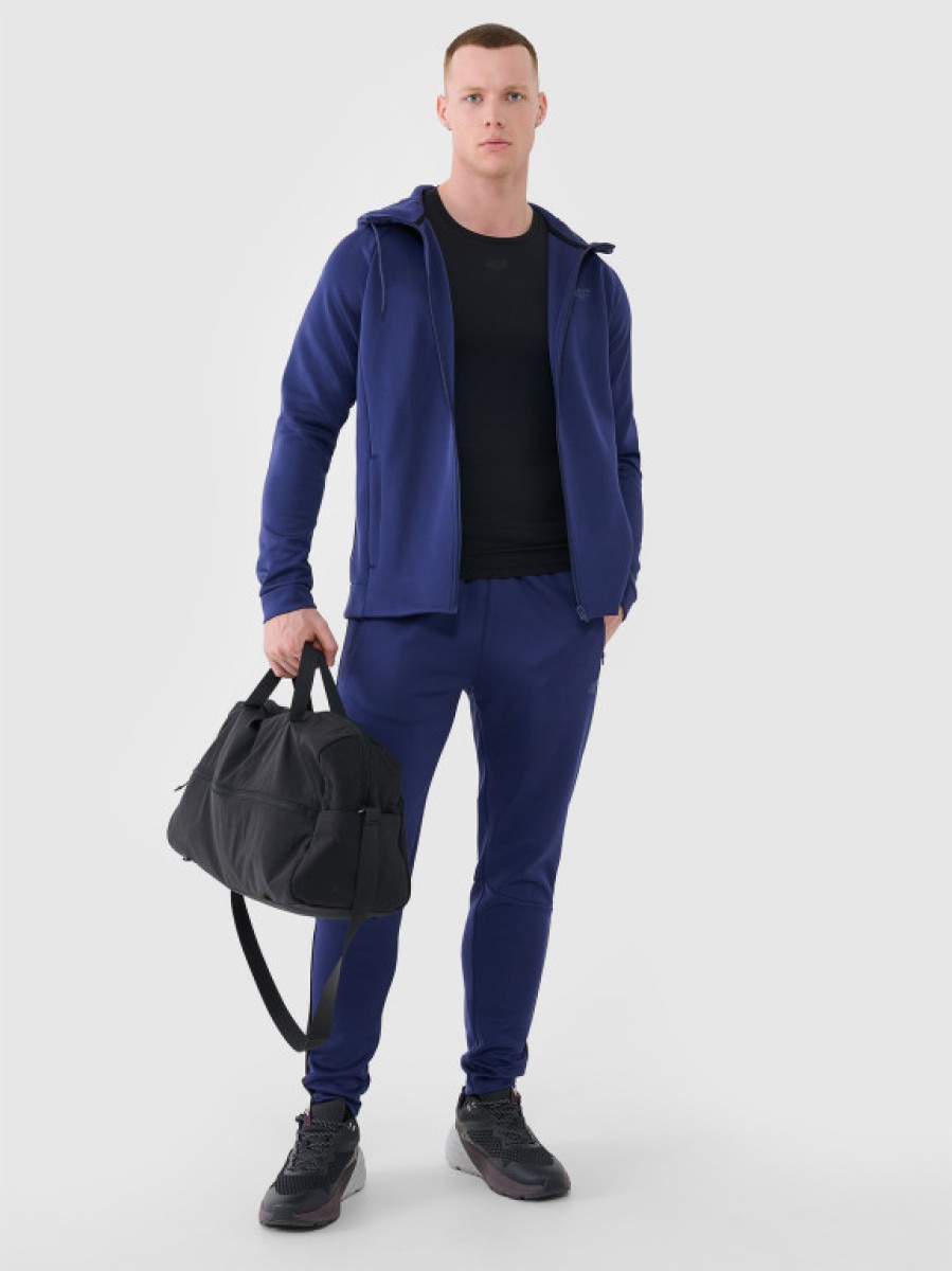 Męskie spodnie treningowe 4F 4FWSS25TFTRM0836 - granatowy