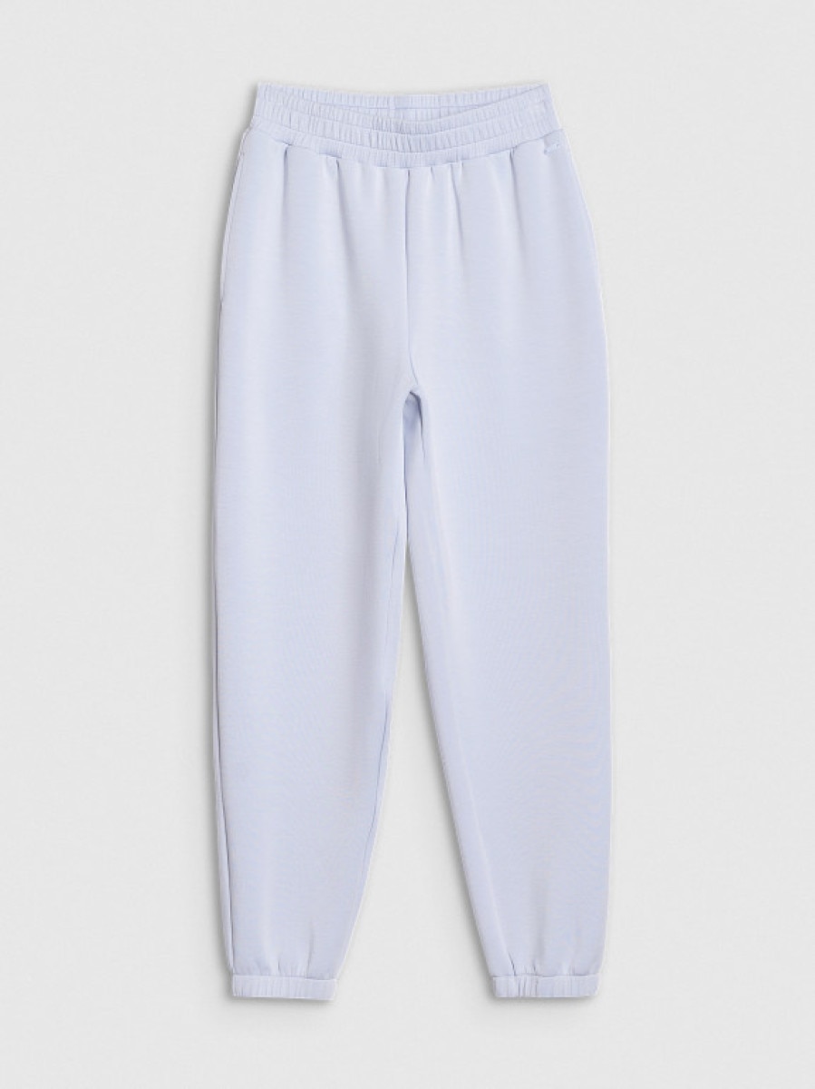 Damskie spodnie dresowe joggery 4F 4FWSS25TTROF1010 - niebieskie