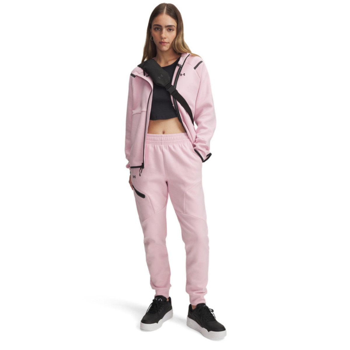 Damskie spodnie treningowe Under Armour Unstoppable Flc Jogger - różowe