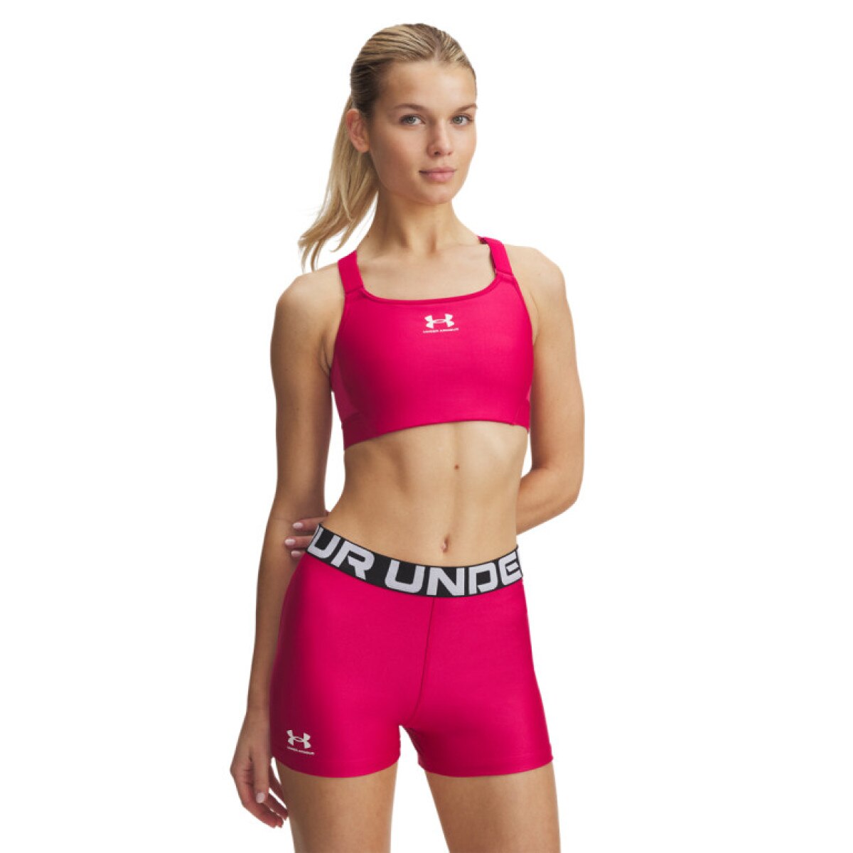 Biustonosz treningowy Under Armour UA HeatGear High - różowy