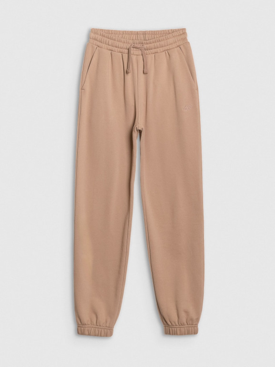 Dziewczęce spodnie dresowe joggery 4F 4FJWSS25TTROF1187 - beżowe