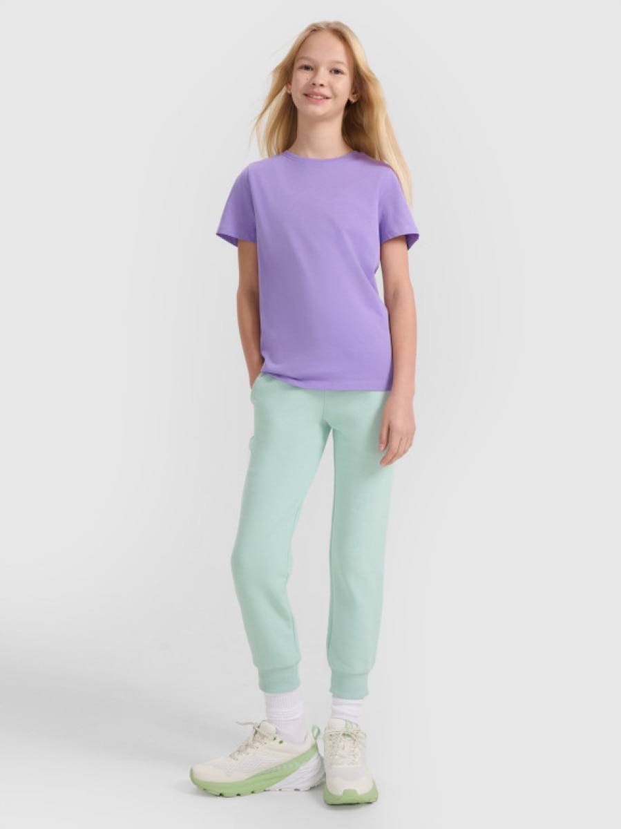 Dziewczęce spodnie dresowe joggery 4F 4FJWSS25TTROF1099 - zielone