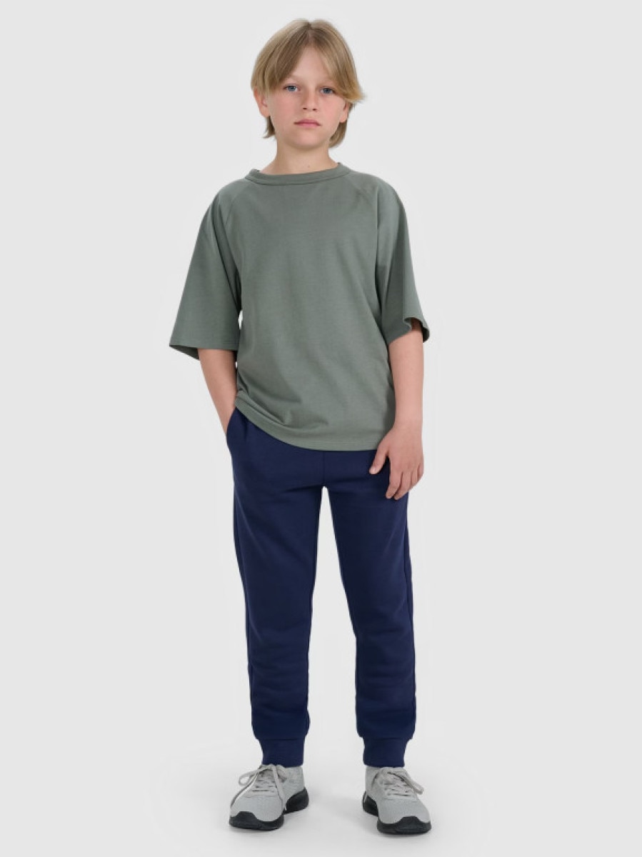 Chłopięce spodnie dresowe joggery 4F 4FJWAW25TTROM1258 - granatowe