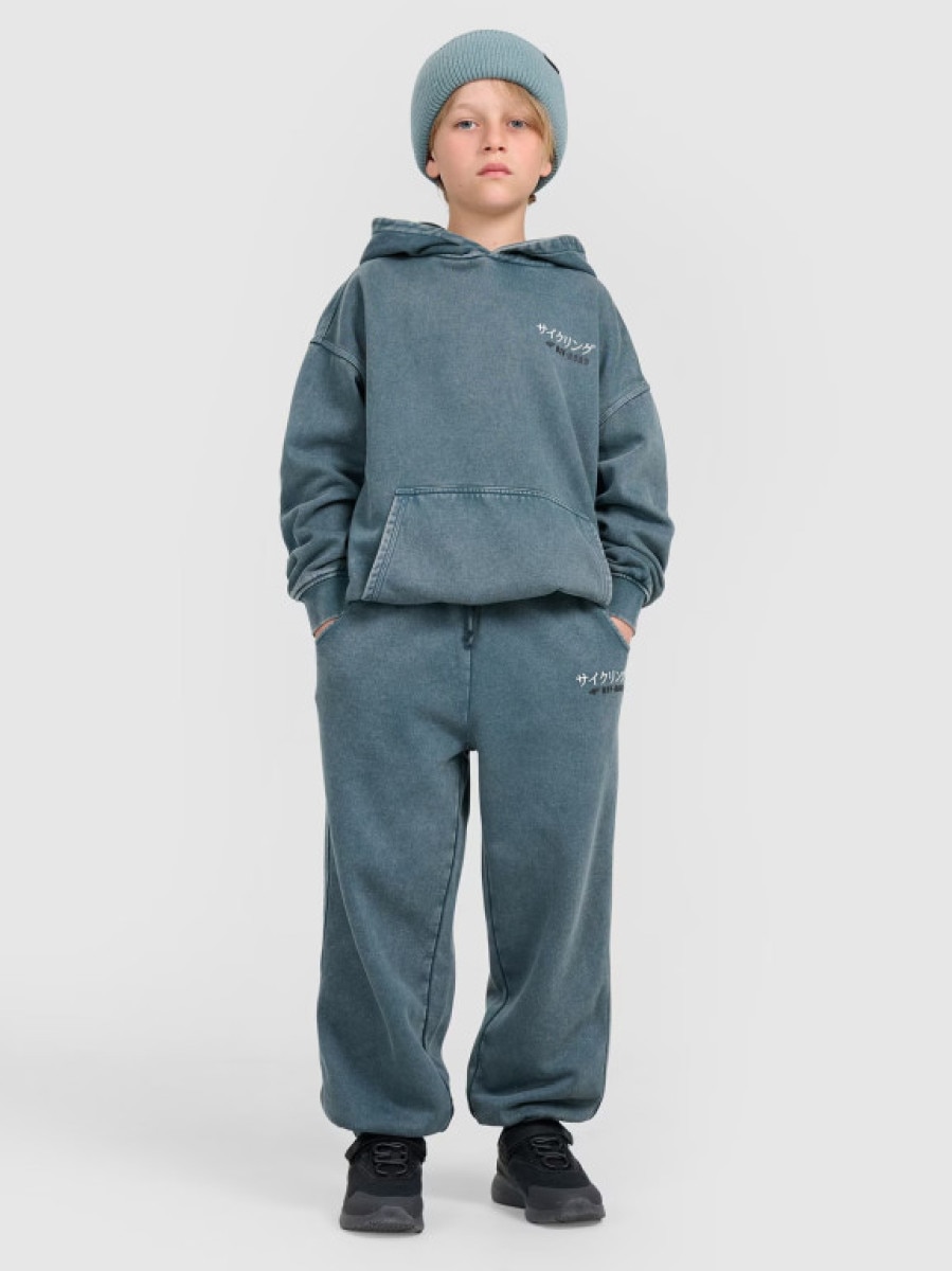 Chłopięce spodnie dresowe joggery 4F 4FJRAW25TTROM1528 - turkusowe