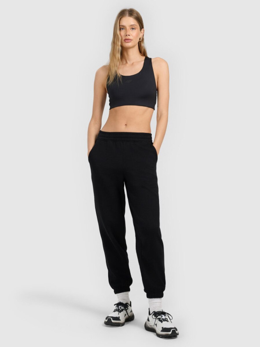 Damskie spodnie dresowe joggery 4F 4FRMM00TTROF1842 - czarne