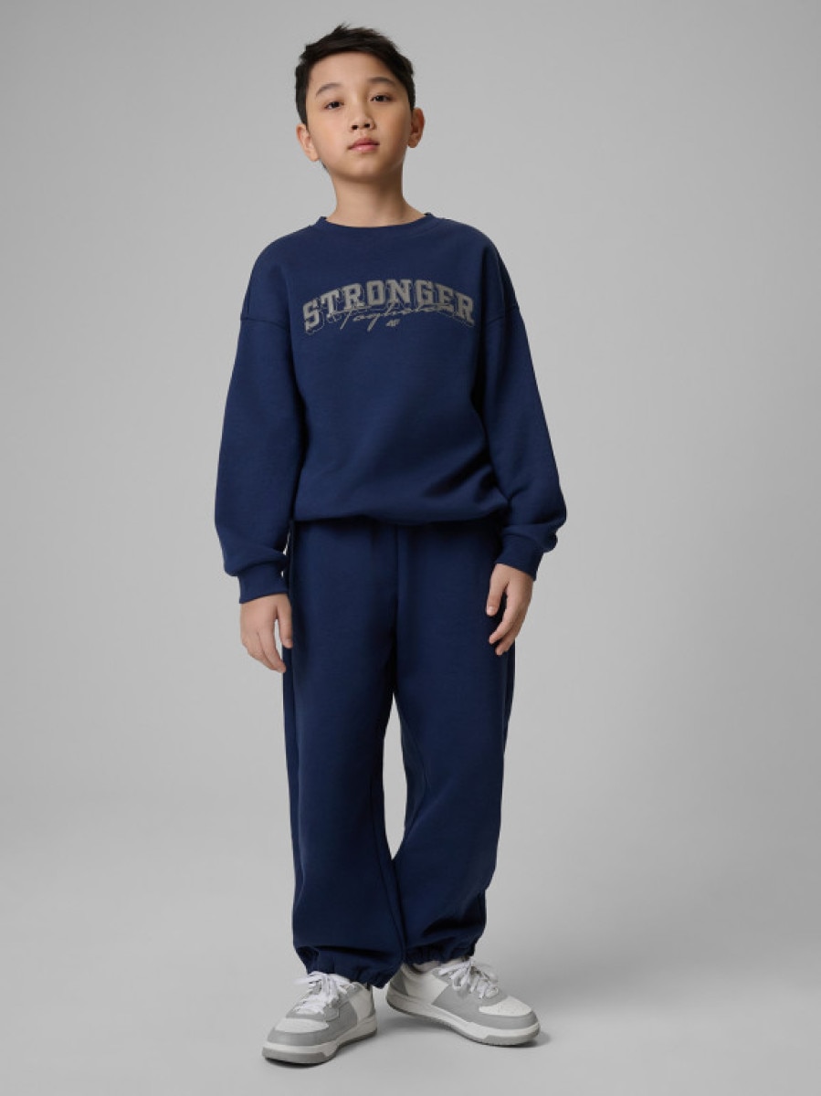 Chłopięce spodnie dresowe 4F 4FJRSS26TTROM1731 - granatowe