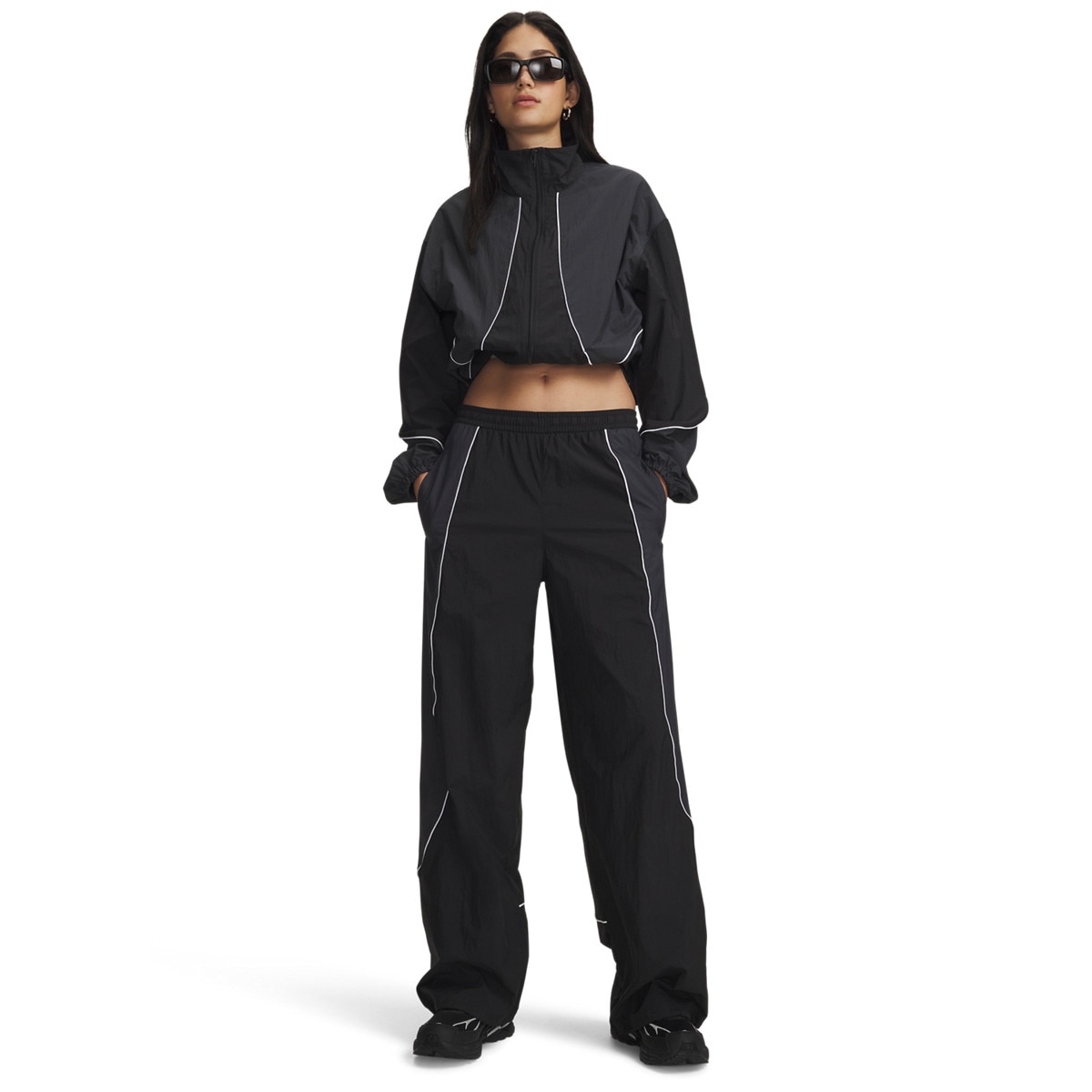 Damskie spodnie sportowe Under Armour Unstoppable Wvn Wind Pnt - czarne