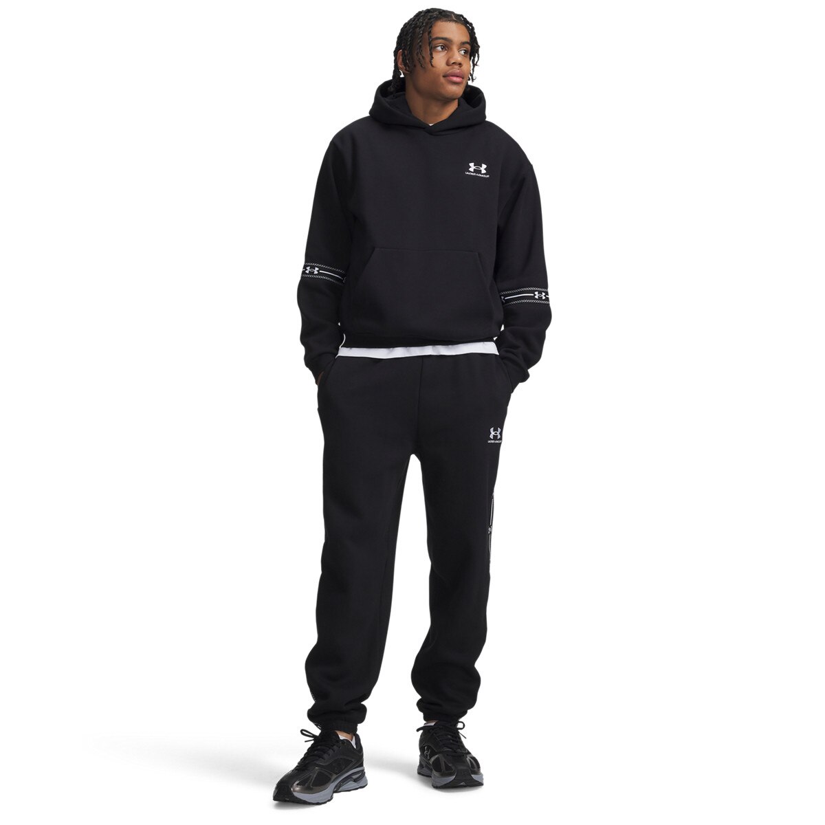 Męskie spodnie dresowe joggery Under Armour UA Icon Flc Taped Jgr - czarne