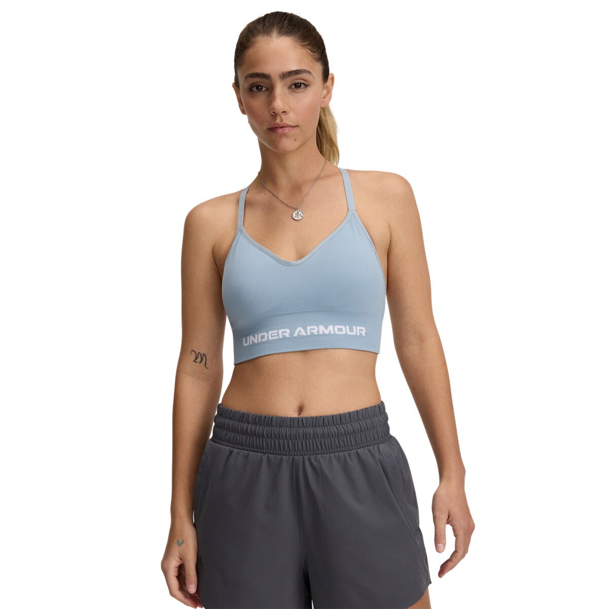 Damski biustonosz treningowy Under Armour Vanish Seamless Low Bra - niebieski