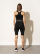 mini: Damskie legginsy kolarki treningowe 4F x Anna Lewandowska 4FSS22TTIGF016 - czarne (4)