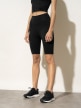 mini: Damskie legginsy kolarki treningowe 4F x Anna Lewandowska 4FSS22TTIGF016 - czarne (2)