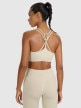 mini: Damski biustonosz treningowy 4F 4FWAW25USBAF218 - beżowy (5)