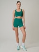 mini: Damskie legginsy krótkie treningowe 4F 4FWSS26TFSTF086 - turkusowe (1)
