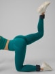mini: Damskie legginsy treningowe 4F 4FWSS26TFTIF457 - turkusowe (2)