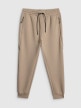 mini: Męskie spodnie dresowe joggery 4F 4FWSS26TTROM1443 - beżowe (7)