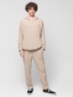 mini: Męskie spodnie dzianinowe Outhorn OTHWSS24TTROM1050 - beżowe (1)