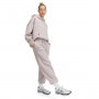 Obrazek dla: UNDER ARMOUR Damskie spodnie dresowe Under Armour UA Icon Hwt Flc Os Pant  beżowe Beżowy