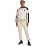 Damskie spodnie treningowe UNDER ARMOUR Project Rock Brahma Pants - kremowe/ecru