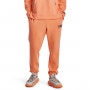 mini: Spodnie treningowe uniseks Under Armour UA Summit Knit Joggers - pomarańczowe (2)