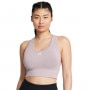 Biustonosz treningowy Under Armour Vanish Seamless Mid Bra - beżowy