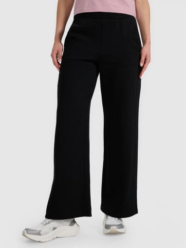 Damskie spodnie dresowe z szerokimi nogawkami 4F 4FRAW25TTROF1614 - czarne