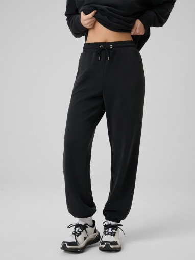 Damskie spodnie dresowe joggery 4F 4FRSS26TTROF1866 - czarne