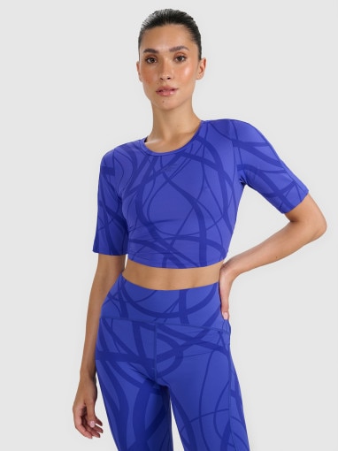  4F Damski crop top treningowy 4F 4FWAW25TFTSF1520  niebieski Niebieski