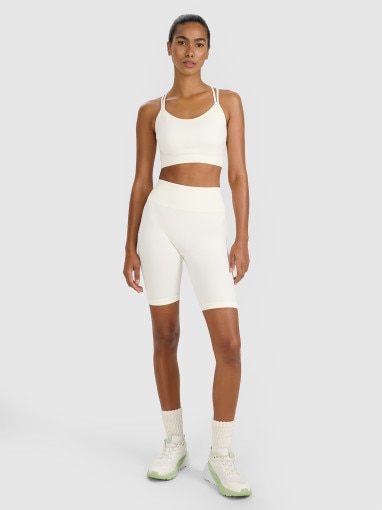 Damski biustonosz treningowy 4F 4FWAW25USBAF218 - beżowy