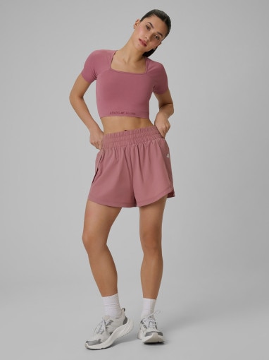 Damski crop top treningowy 4F 4FWSS26TFTSF1812 - różowy