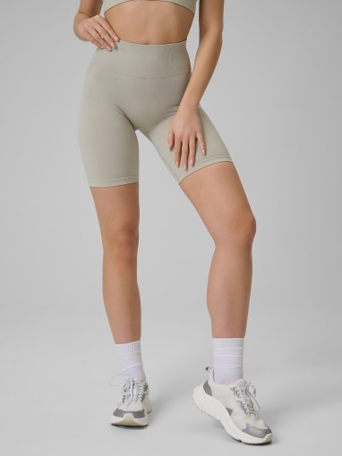 Damskie legginsy kolarki treningowe 4F 4FWSS26TFSTF109 - beżowe