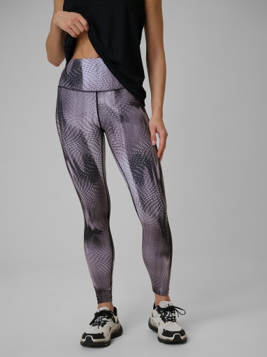 Damskie legginsy treningowe 4F 4FWSS26TFTIF454 - fioletowe