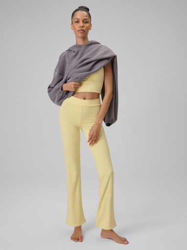  4F Damskie spodnie do jogi 4F 4FRSS26TFTRF1391  żółte żółty