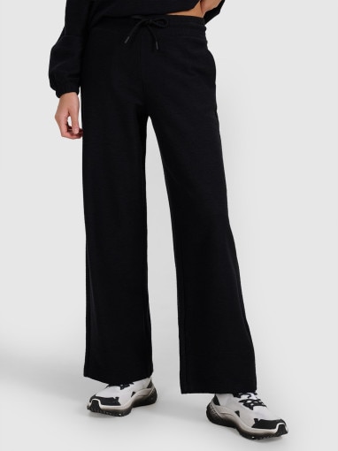 Damskie spodnie dresowe 4F 4FRAW25TTROF1669 - czarne