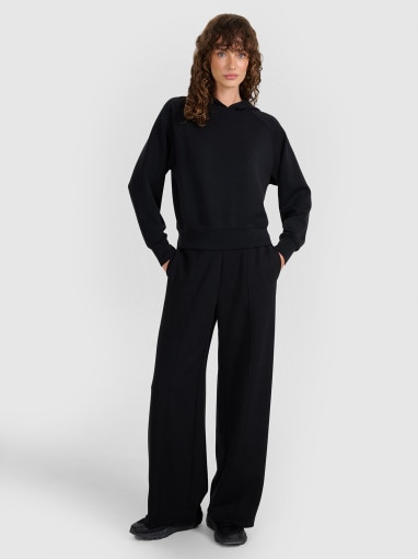  4F Damskie spodnie dresowe 4F 4FWAW25TTROF1181  czarne Czarny