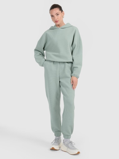  4F Damskie spodnie dresowe 4F 4FWAW25TTROF1184  zielone Zielony