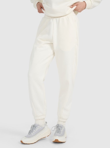Damskie spodnie dresowe joggery 4F 4FWAW25TTROF1185 - białe
