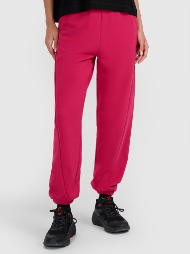 Damskie spodnie dresowe joggery 4F 4FWAW25TTROF1205 - różowe