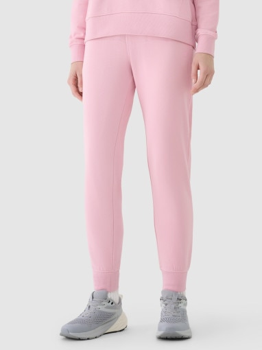Damskie spodnie dresowe joggery 4F 4FWMM00TTROF1386 - różowe