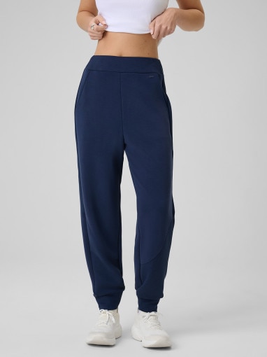 Damskie spodnie dresowe joggery 4F 4FWSS26TTROF1410 - granatowe