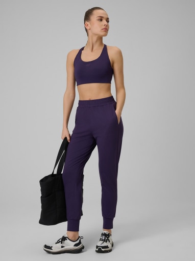  4F Damskie spodnie treningowe 4F 4FWSS26TFTRF1074  fioletowe Fioletowy