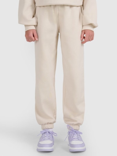 Dziewczęce spodnie dresowe joggery 4F 4FJRAW25TTROF1473 - białe