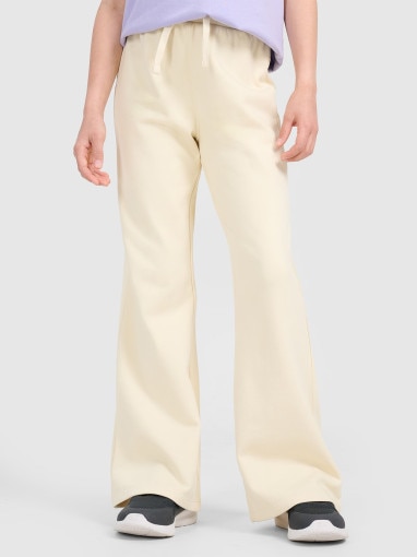 Dziewczęce spodnie dresowe 4F 4FJRAW25TTROF1600 - beżowe