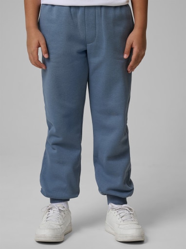 Chłopięce spodnie dresowe joggery 4F 4FJRSS26TTROM1824 - denim